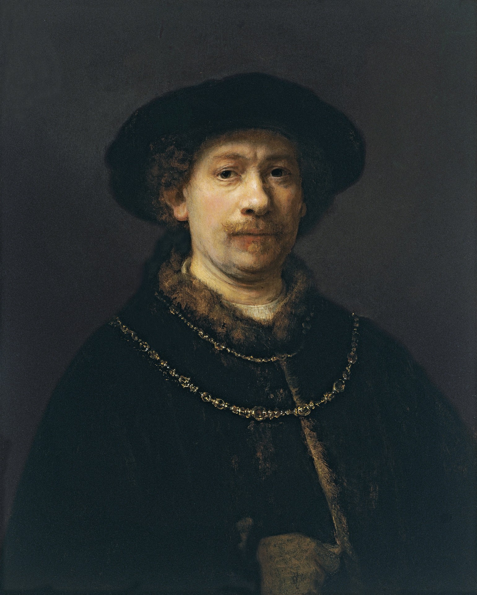 Self-portrait wearing a Hat and two Chains - by Rembrandt