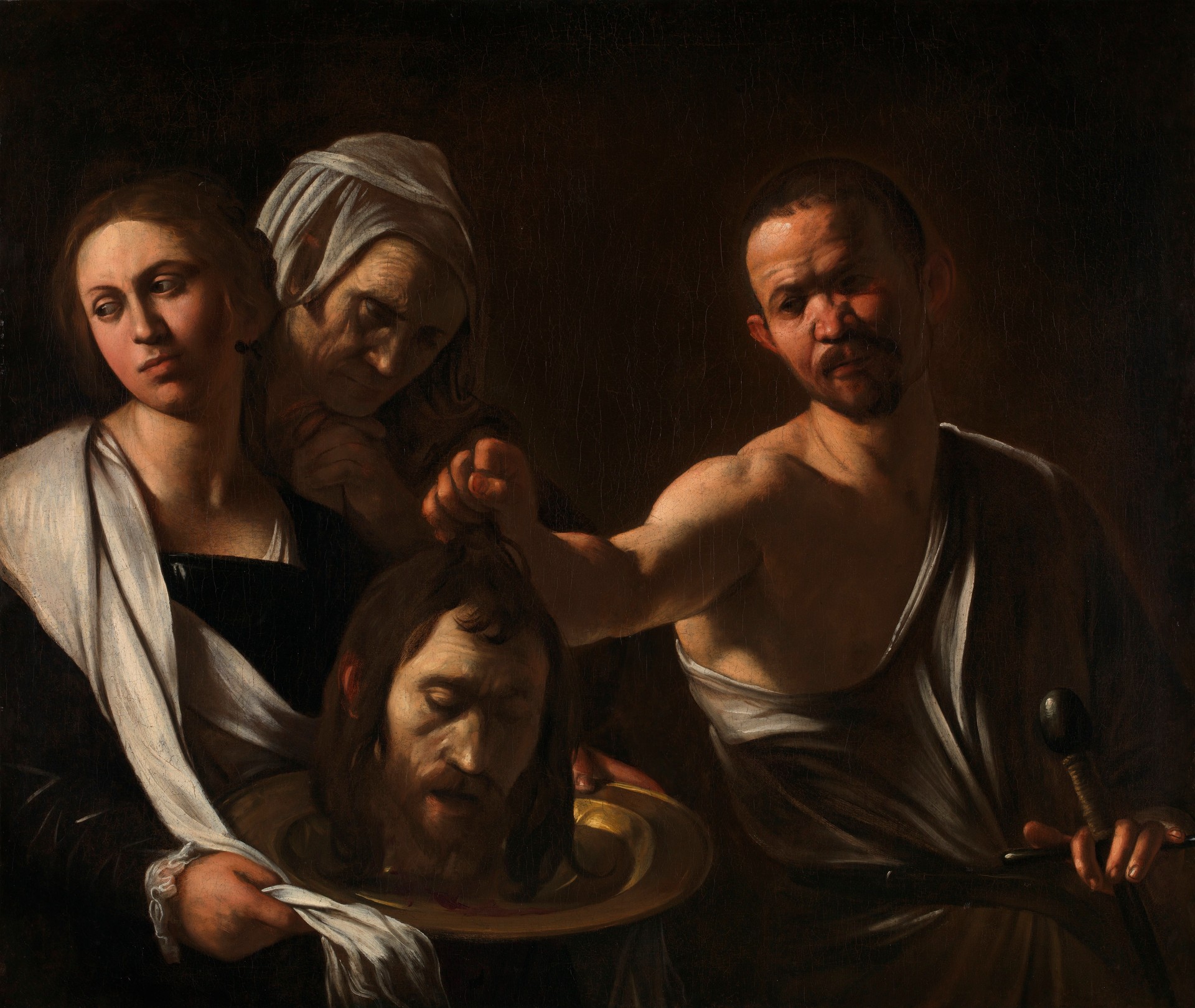 Salome receives the Head of John the Baptist - by Caravaggio