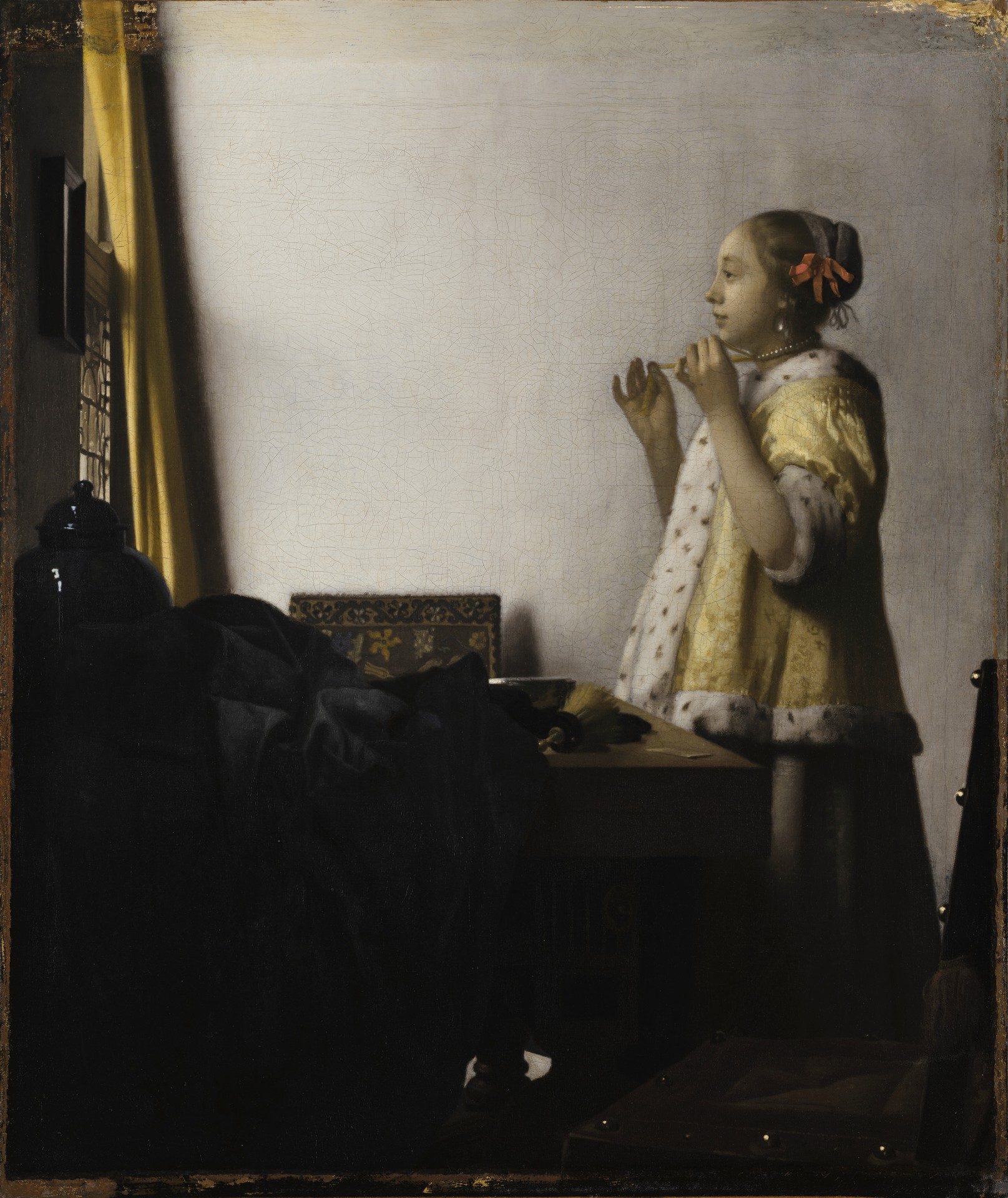 Young Woman with a Pearl Necklace - by Johannes Vermeer