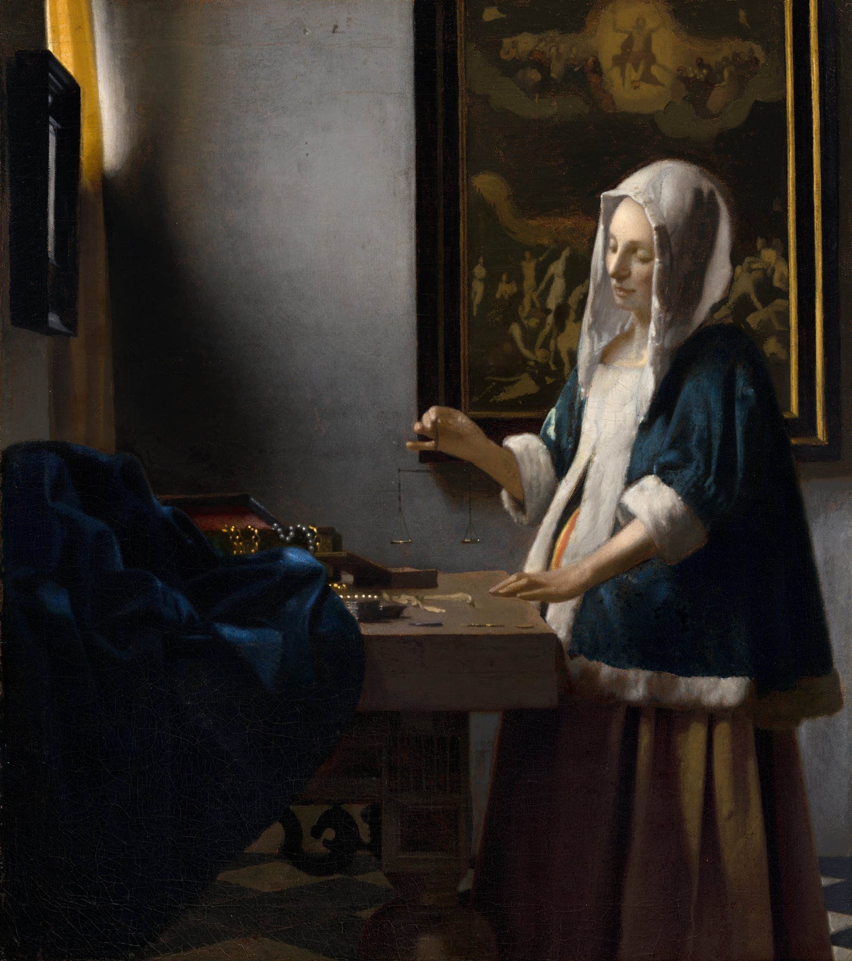 Woman Holding a Balance - by Johannes Vermeer