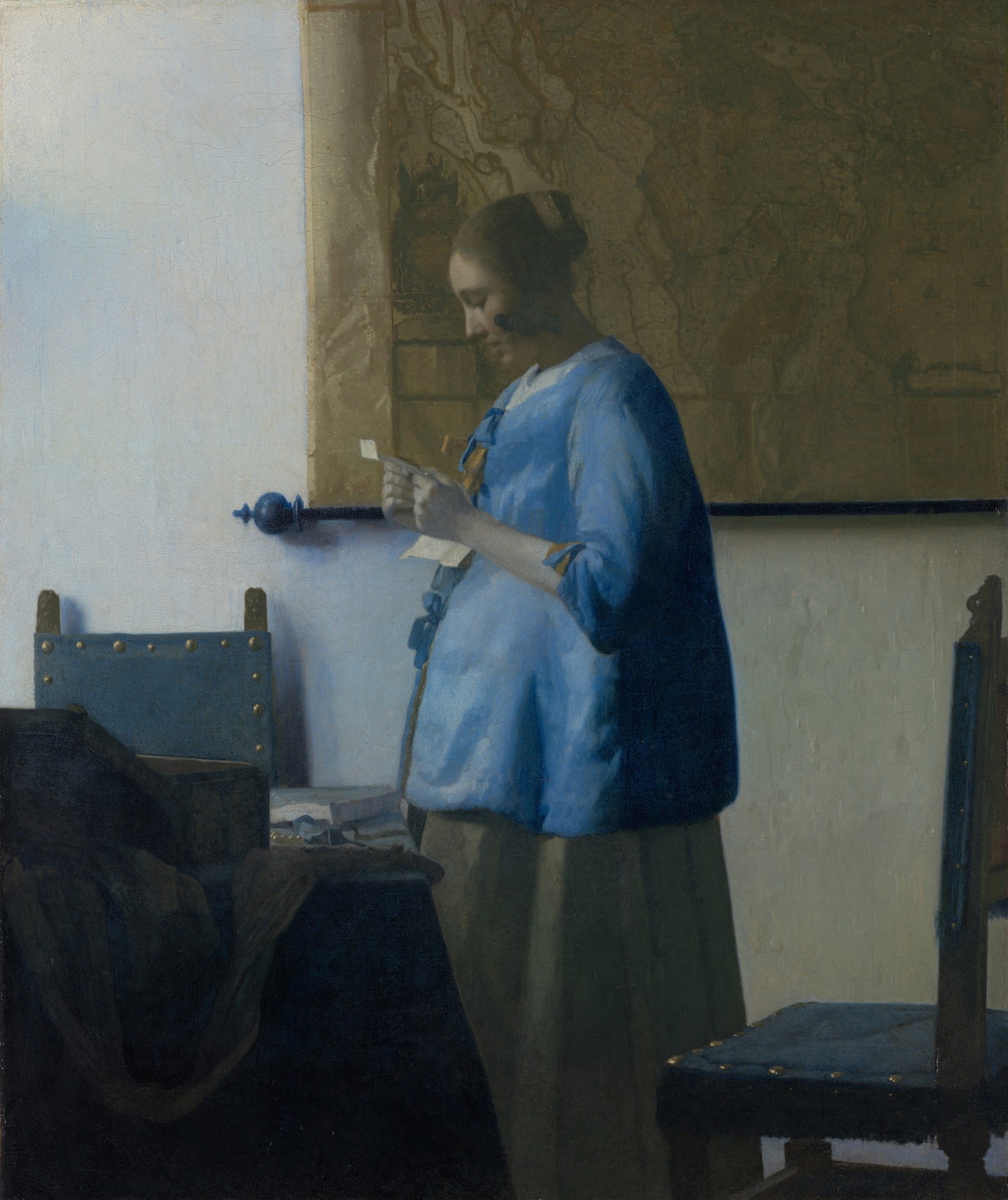 Woman Reading a Letter - by Johannes Vermeer